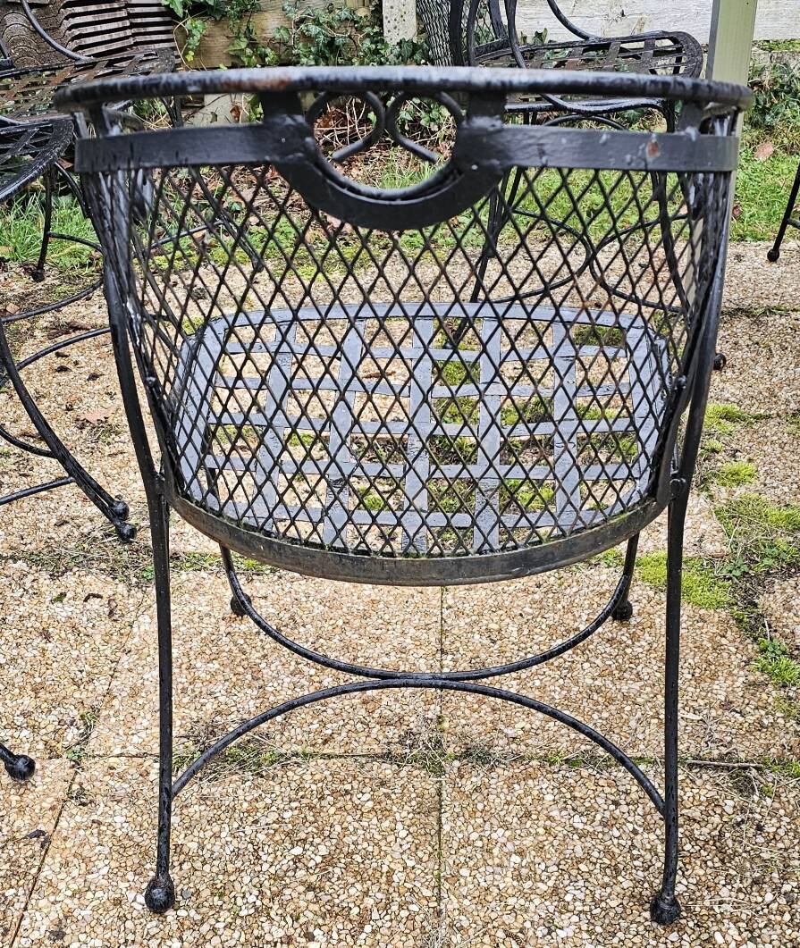 4 wrought iron garden chairs