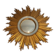 Miroir soleil en résine dorée