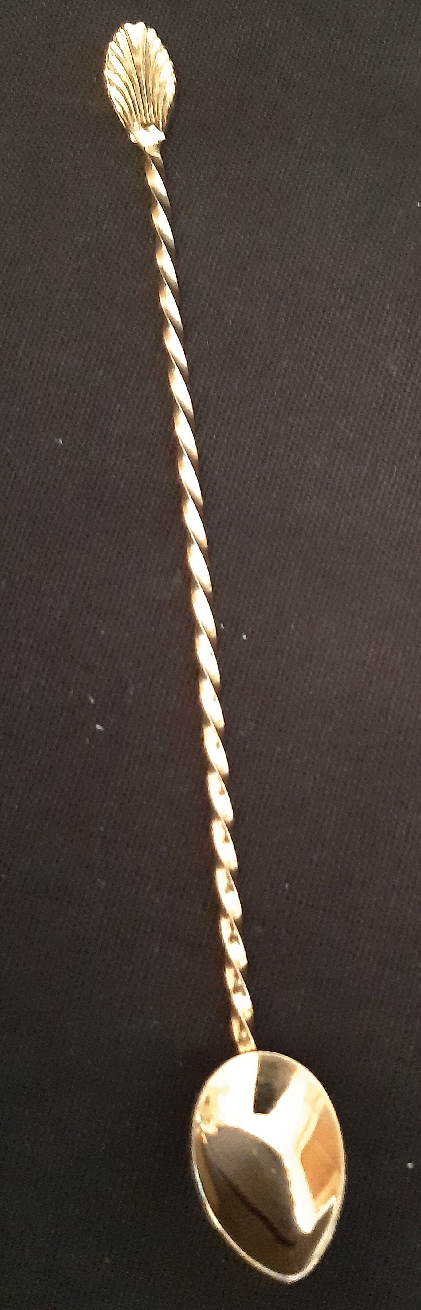 Set of 8 golden cocktail spoons