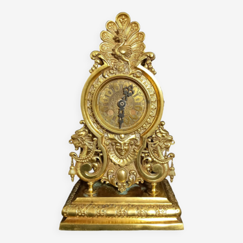 Pendule style napoléon iii en bronze doré avec dragons et paon