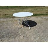 Wrought iron garden table, circa 1900
