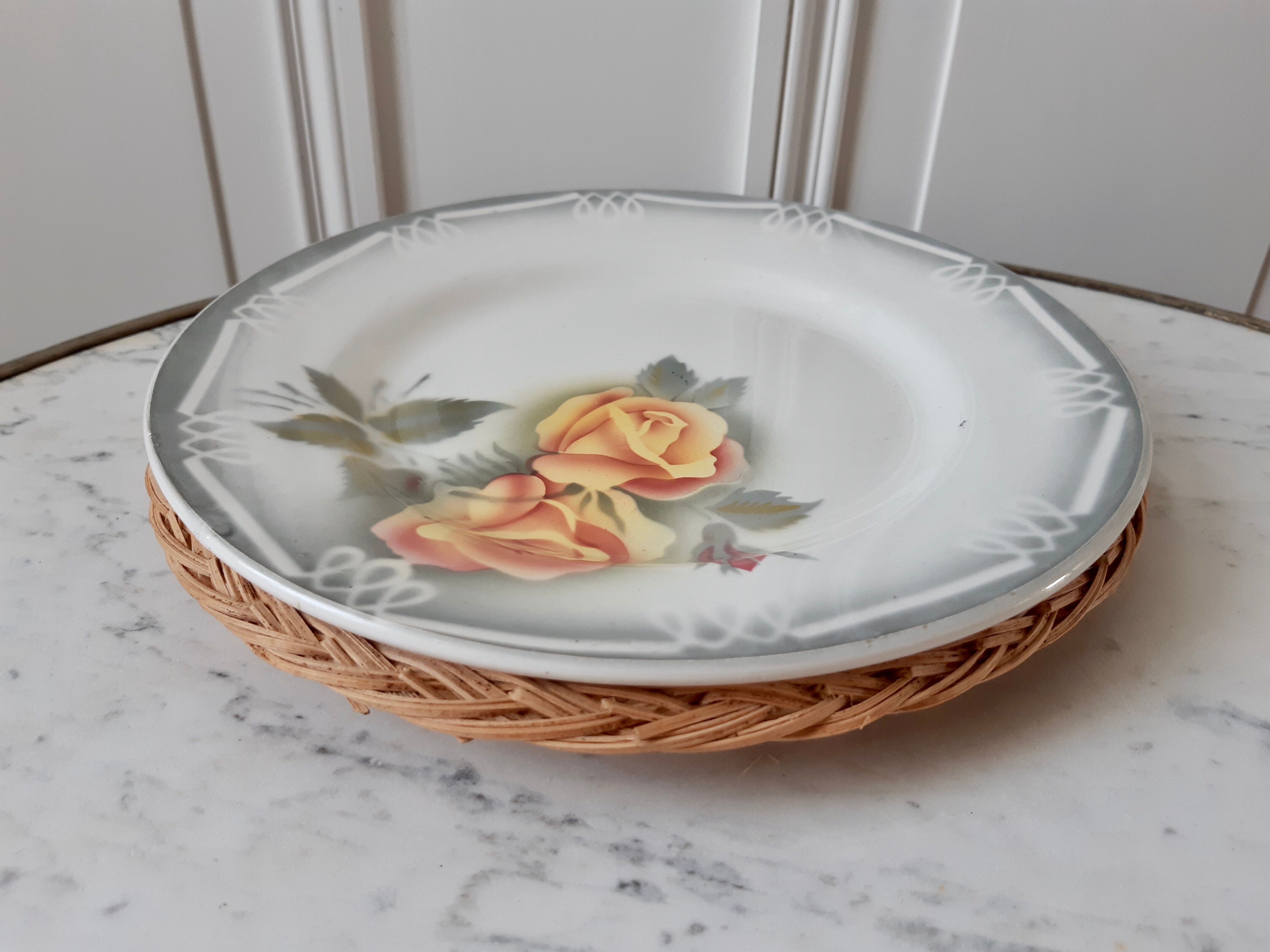 Underside of vintage wicker plates 70s