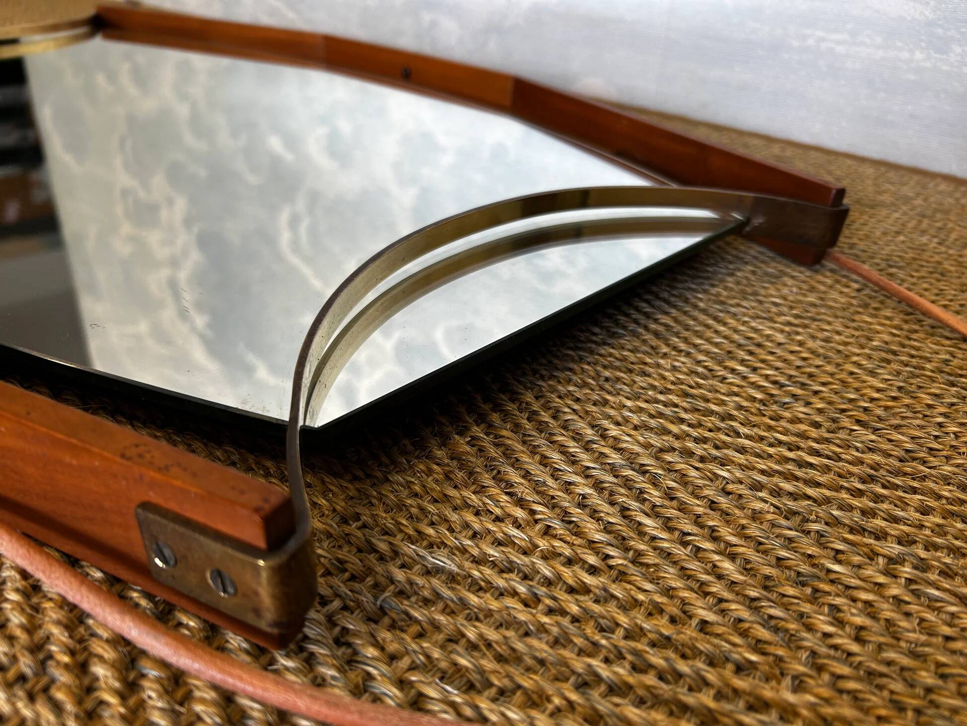 Wall mirror with brass detail and leather mounting, Vetreria Andreini, Ravenna, Italy, 1950s
