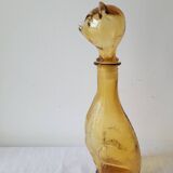 Zoomorphic carafe in amber glass