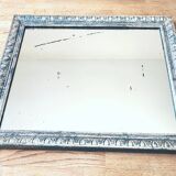 Old mercury mirror, in carved wood with silver leaf.