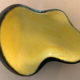 Yellow and black ceramic ashtray