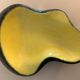 Yellow and black ceramic ashtray