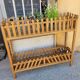 Jardinière sur pied en bois