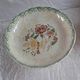 Ceramic compote with floral decoration
