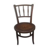 Antique children's chair in curved wood