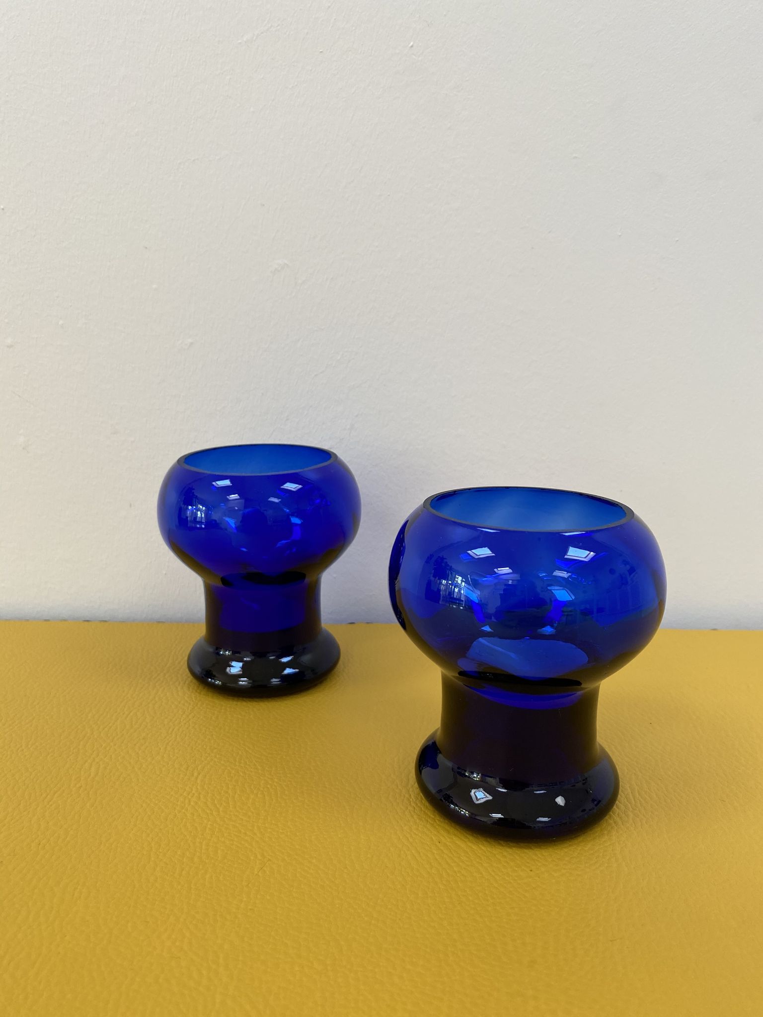Duo of cobalt blue glass candlestick photophores