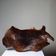 Large monoxyle bowl made of dark raw olive wood from the 1950s.