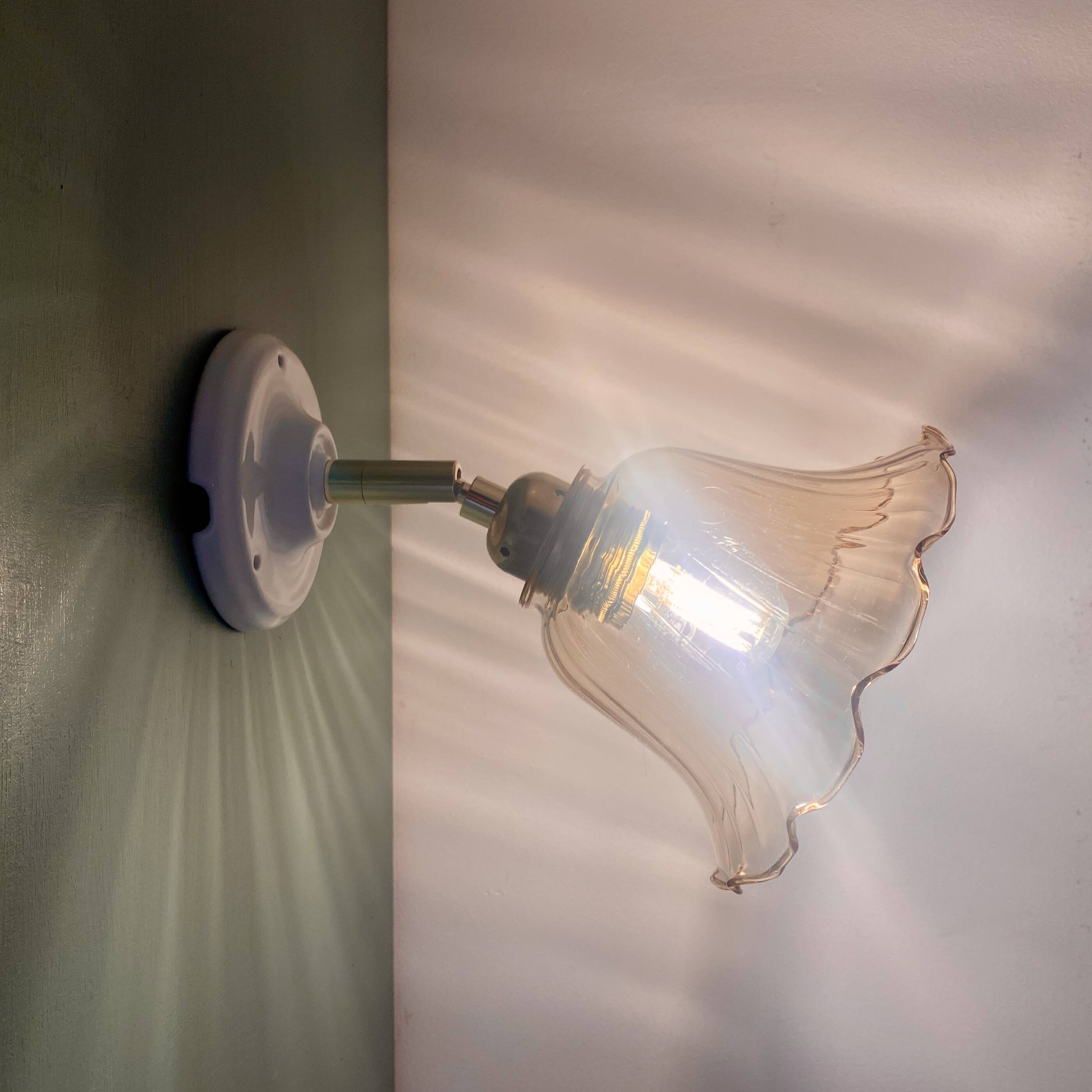 Vintage tulip wall light in amber glass