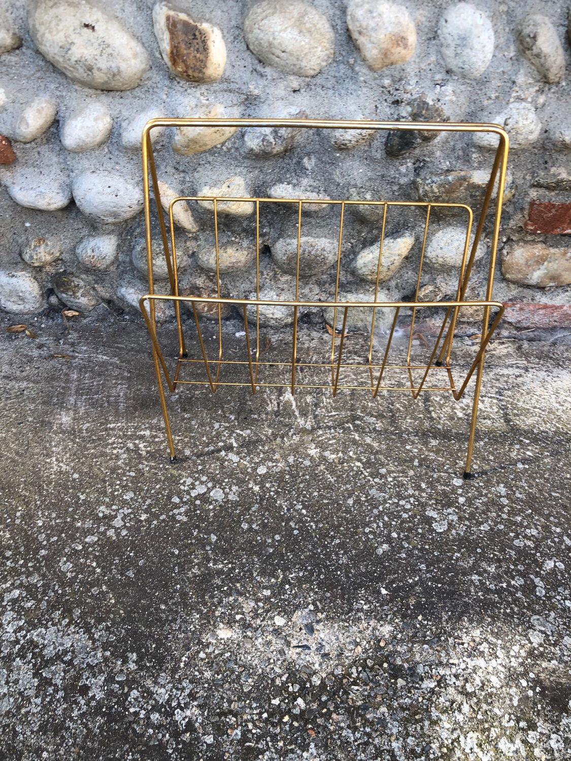 Golden magazine holder