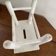 Small footrest bench in patinated white wood