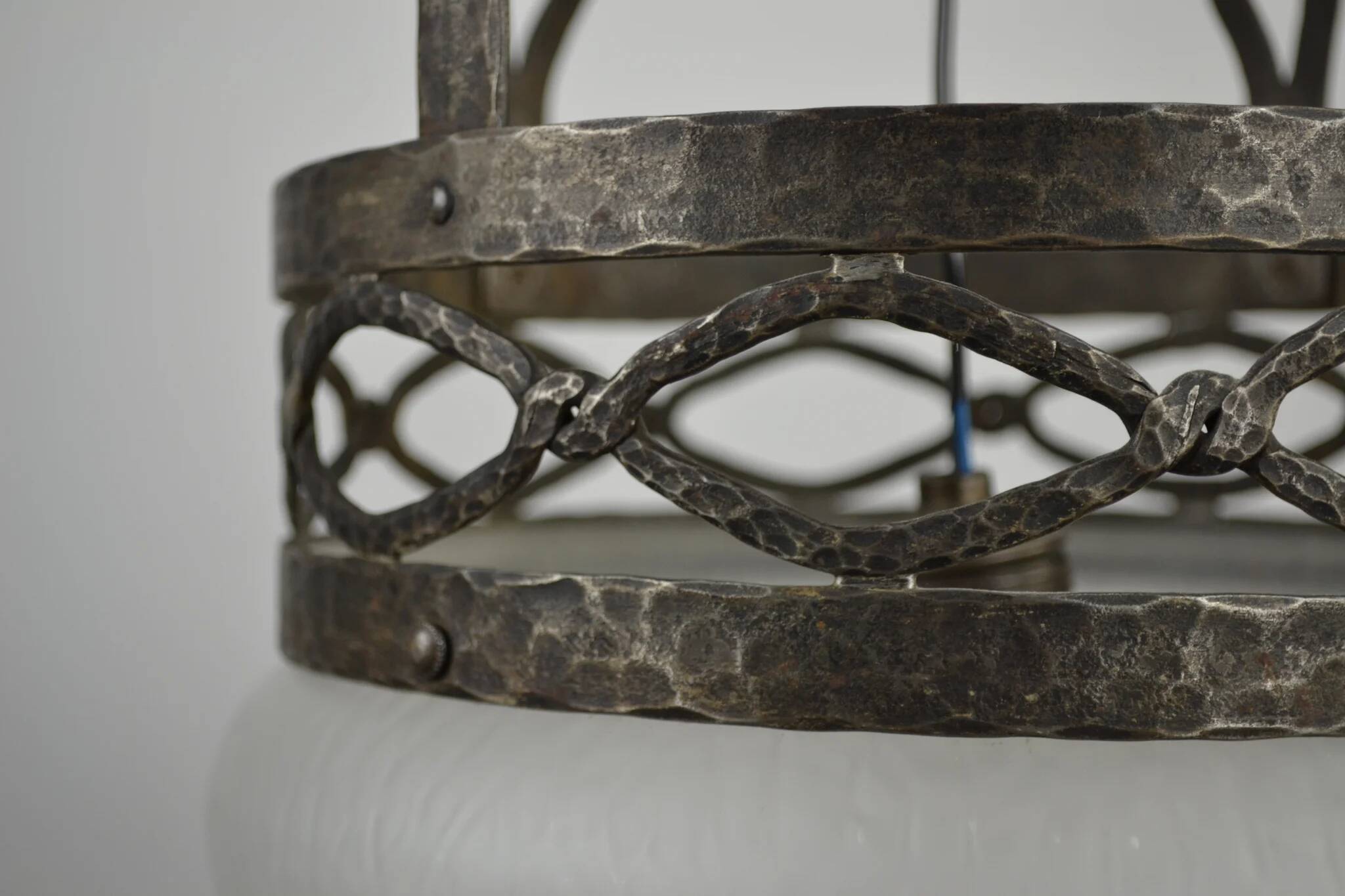 Ceiling lamp, hand-forged hammered iron with glass shade, early 20th century, Sweden
