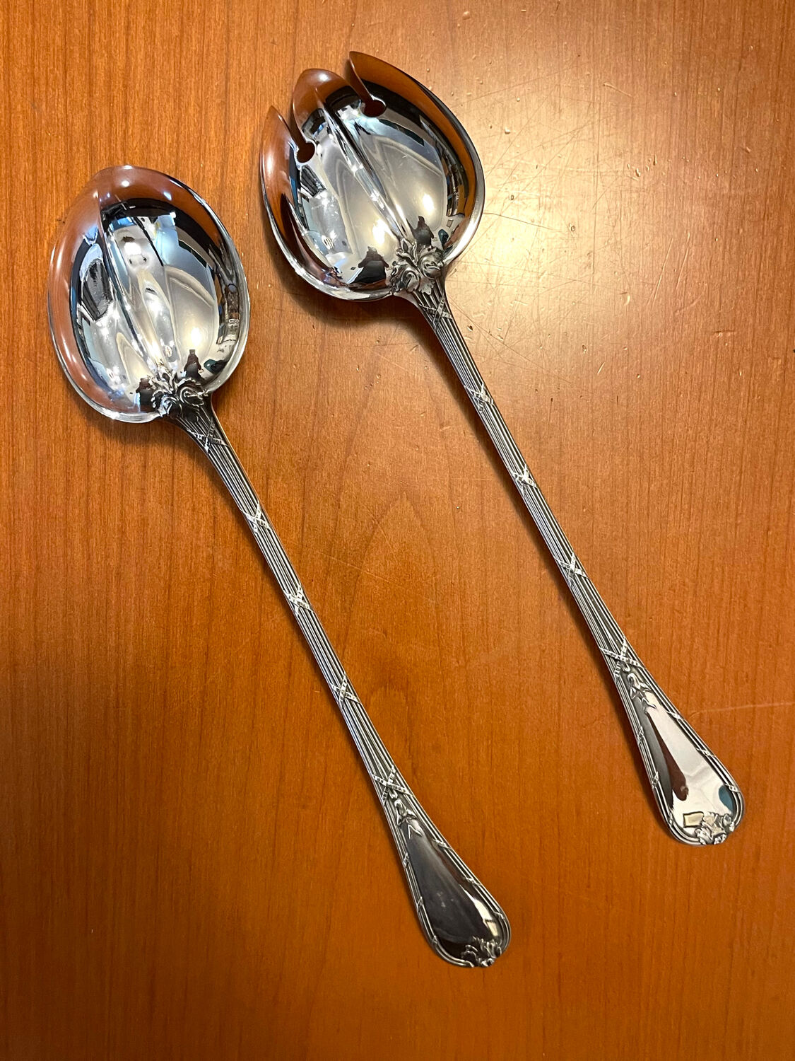 Christofle ribbon and bell-shaped salad serving pieces, very beautiful and