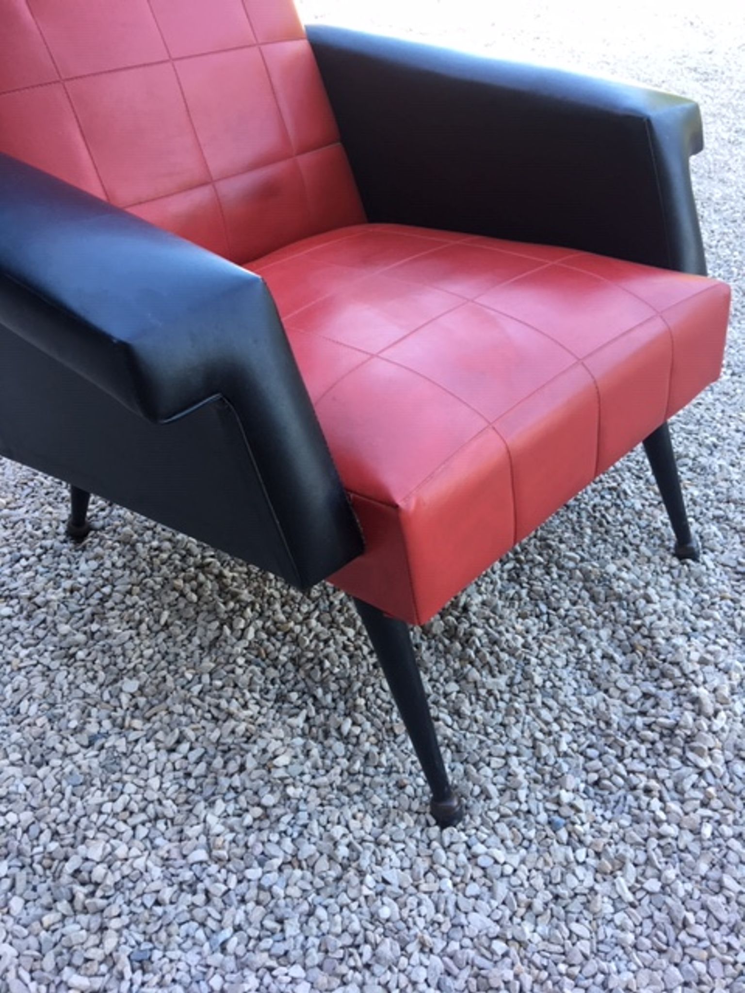 Vintage armchair in red and black skaï from the 1960s