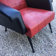 Vintage armchair in red and black skaï from the 1960s