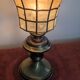 Brass and mother-of-pearl lamp. Lighthouse.