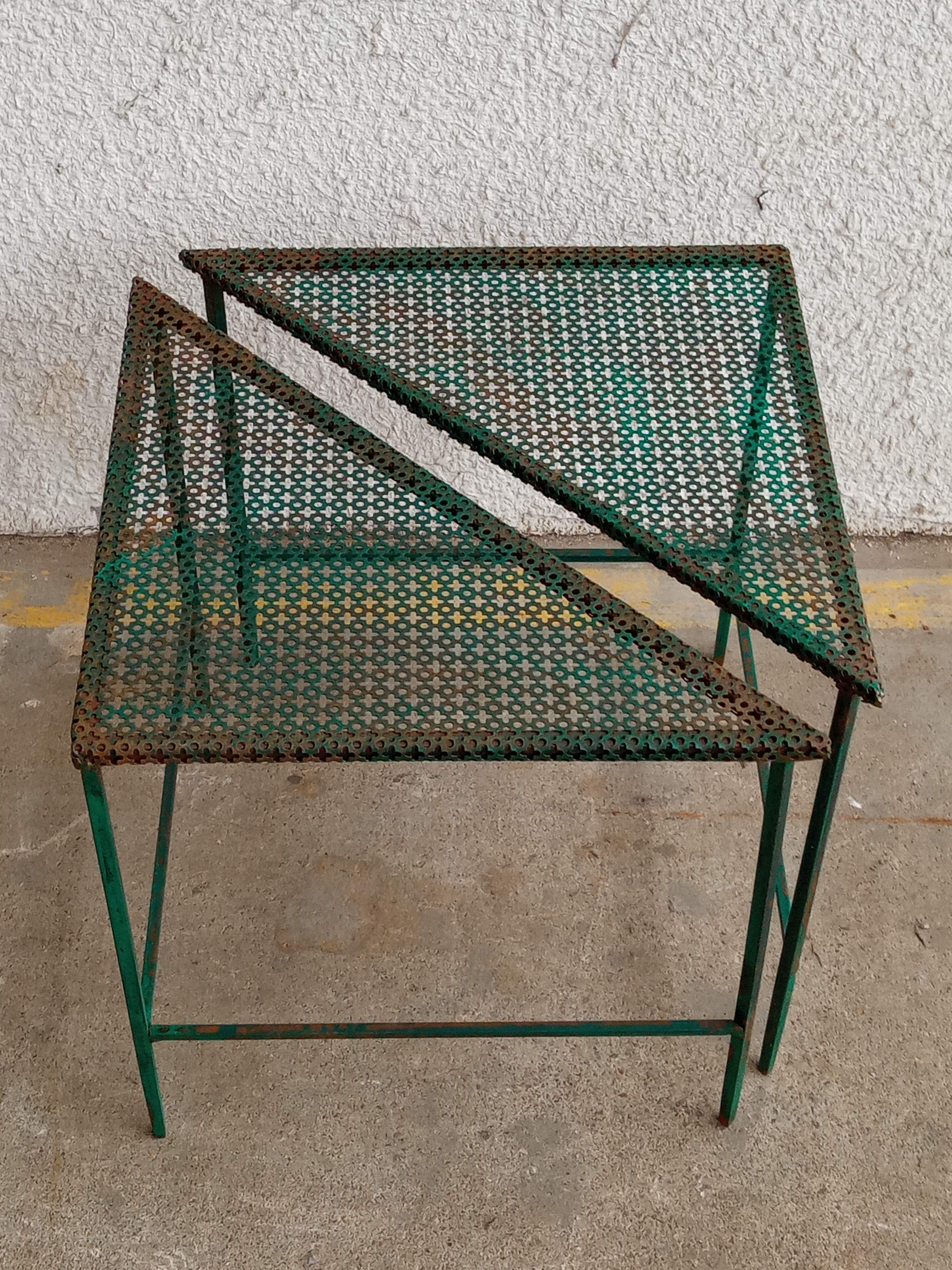 Triangular coffee table in perforated metal Mathieu Mategot