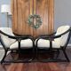 Set of two vintage black and white bamboo chairs.