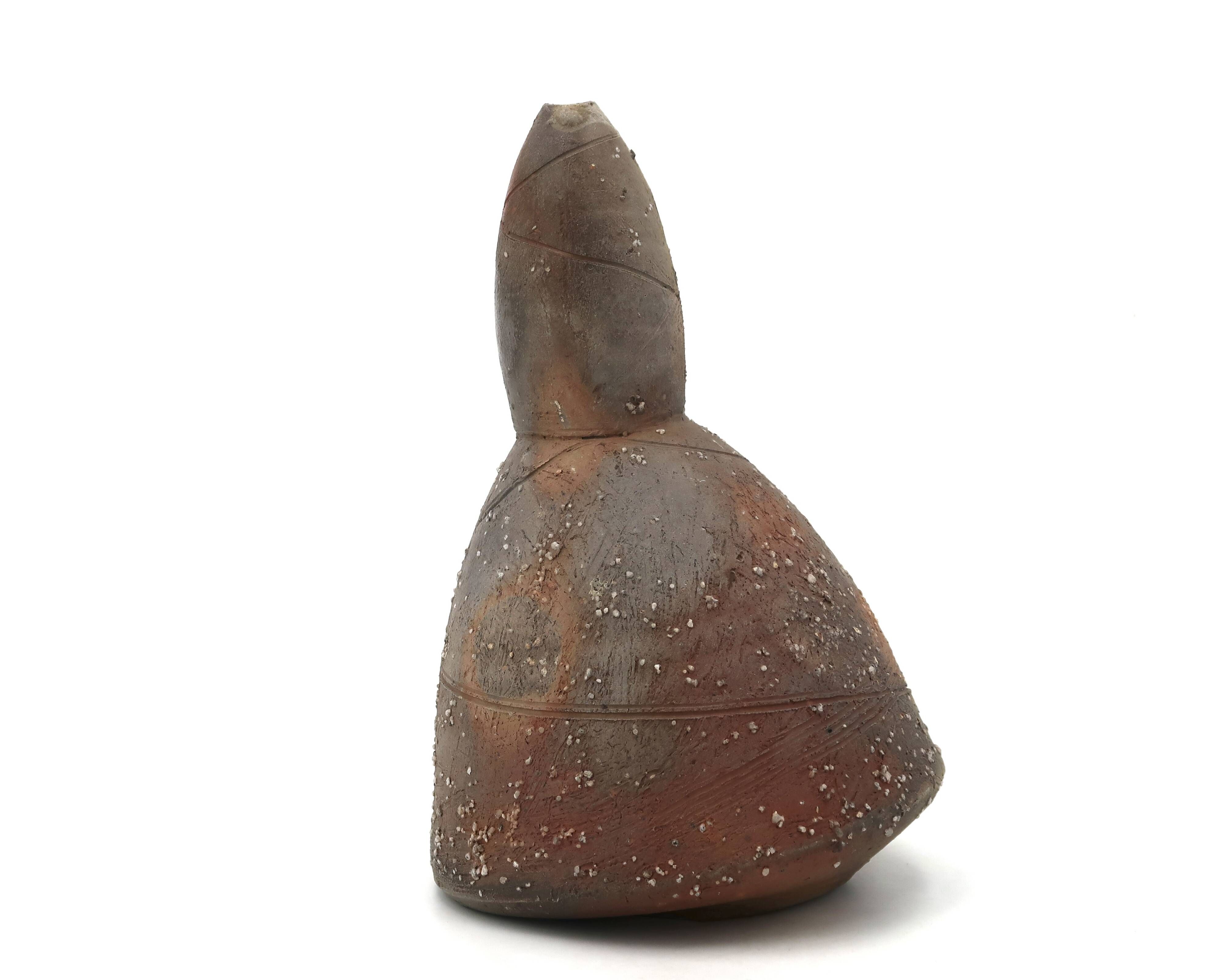 Sandstone sculpture by Eric Astoul, ceramic wood-fired kiln.