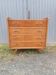 Vintage chest of drawers with tapered legs