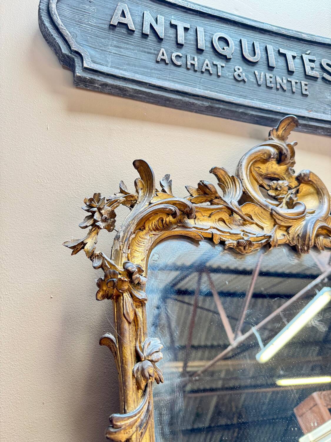 Louis XV period wooden and gilded stucco mirror, 18th century