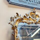 Louis XV period wooden and gilded stucco mirror, 18th century