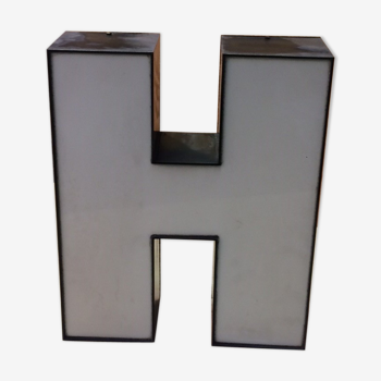 Large metal sign and plexi letter
