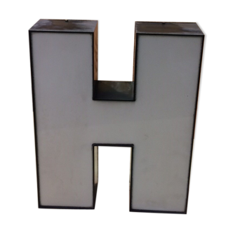 Large metal sign and plexi letter