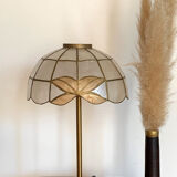 Table lamp with a vintage mother-of-pearl lampshade set and a golden foot