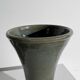 Dark green handcrafted vase with glazed ceramic grass blades
