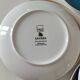 Set of 7 porcelain plates, gold foliage & jungle
