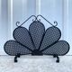 Vintage 1950s fireplace screen, fan shape.