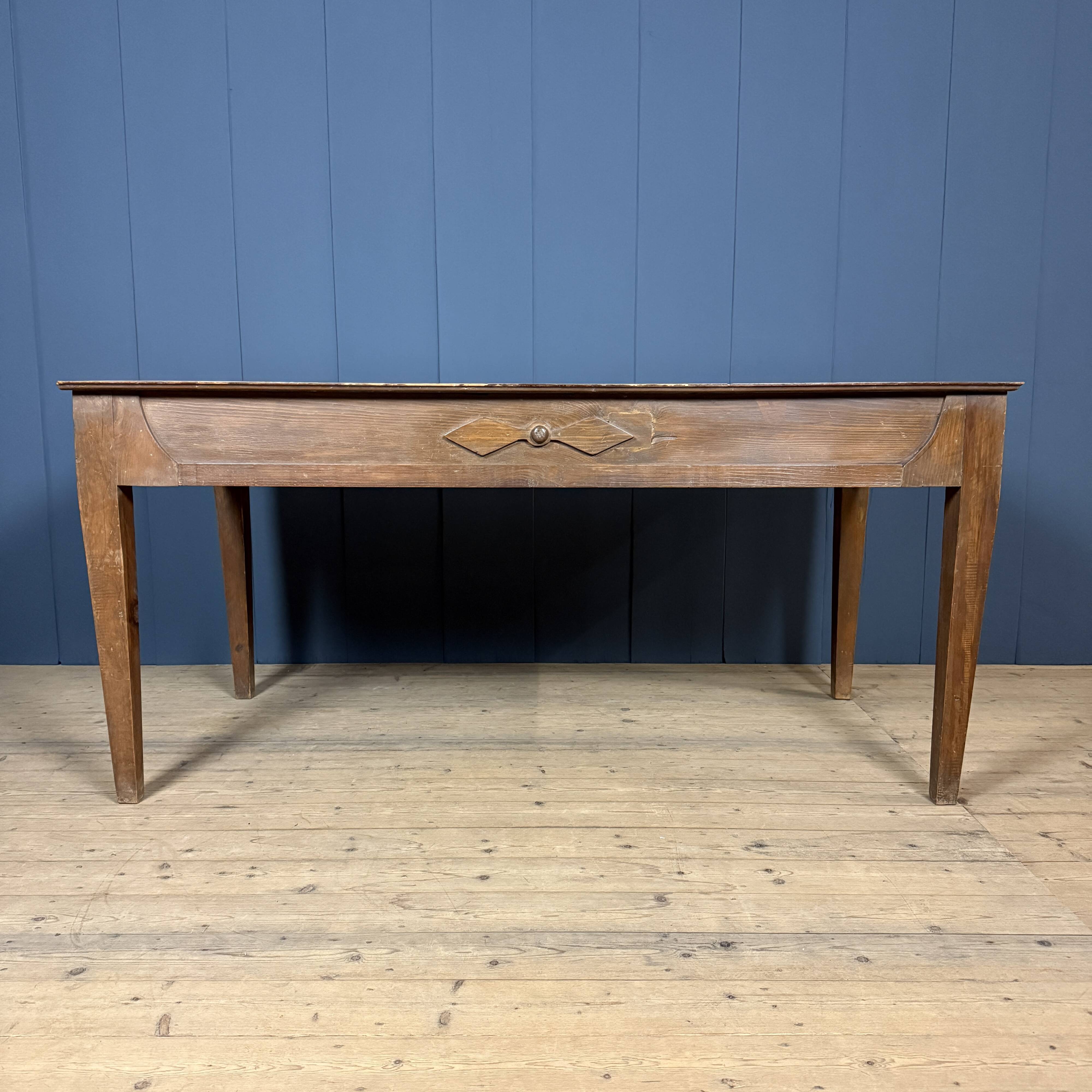 Old decorated wooden kitchen table