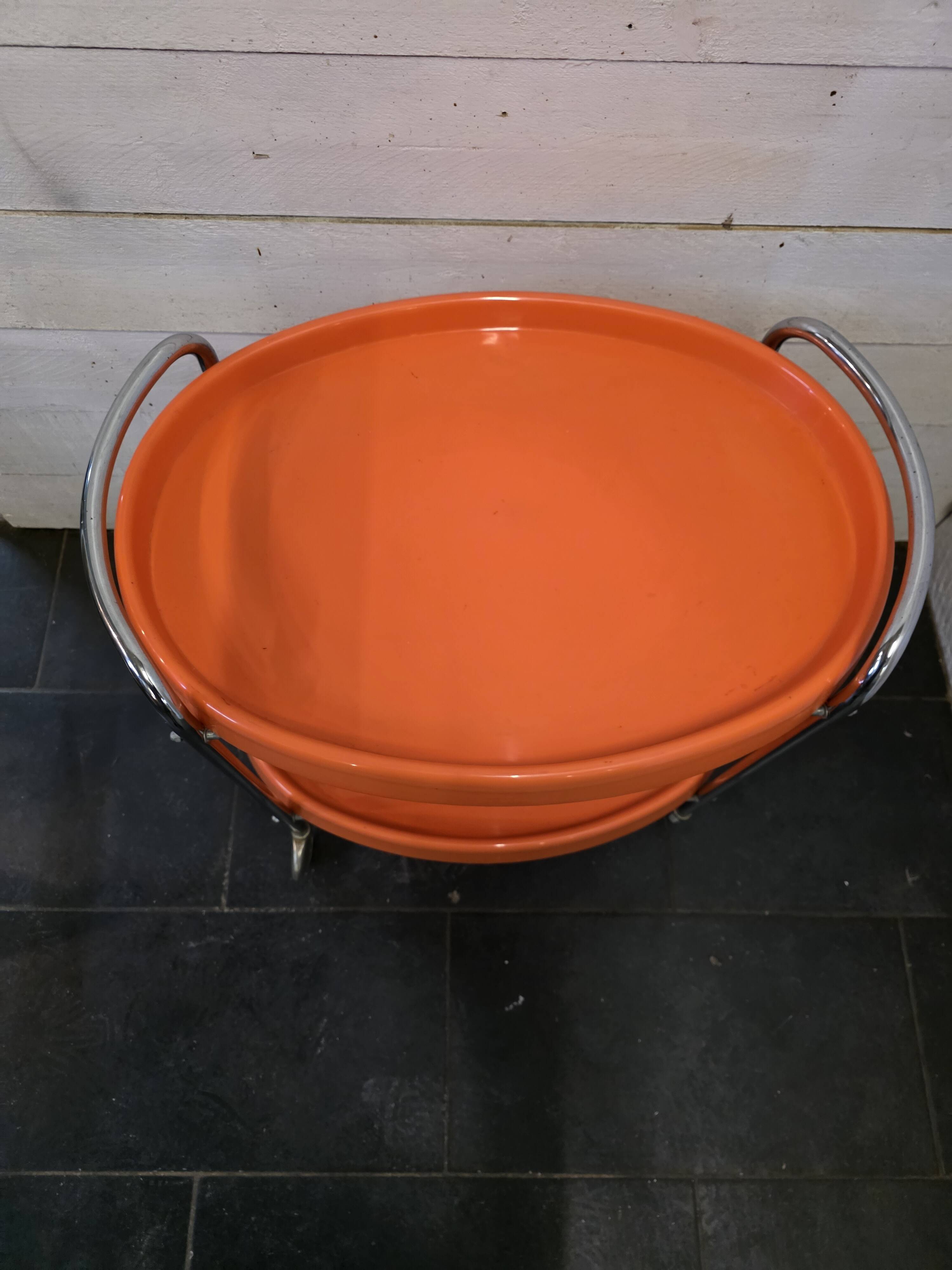 Orange rolling trolley from the 70s