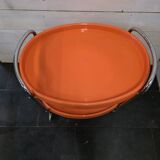 Orange rolling trolley from the 70s