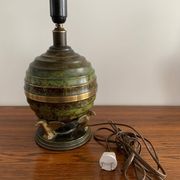 Art Deco table lamp in patinated bronze with eagles holding a globe, France 1940.