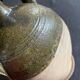 Persimmon glazed terracotta oil jar