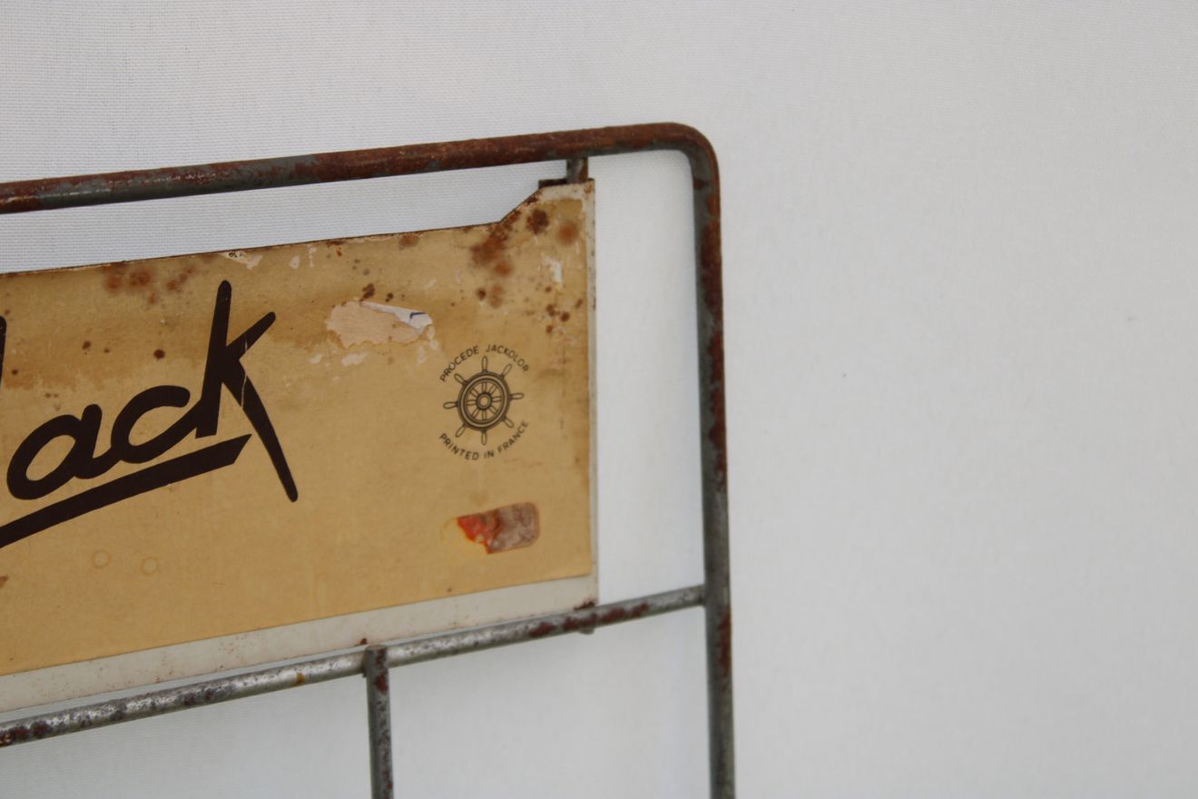 Former metal newspaper display