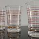 Set of 7 vintage glasses with gold and red edges from the 50s/60s