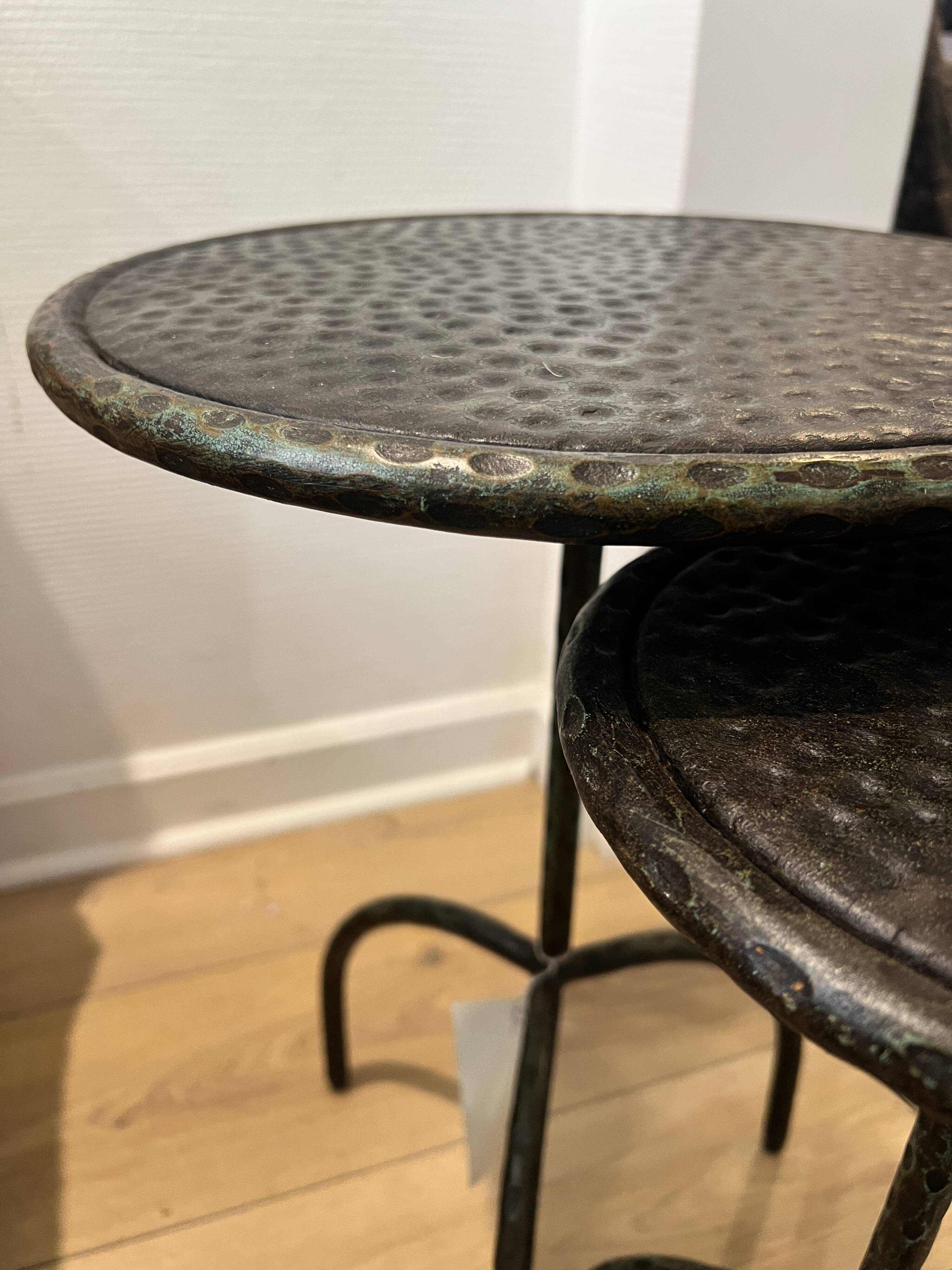 Set of hammered metal tables
