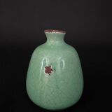 Vase en céramique craquelée XXe fond vert