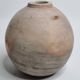 Round ceramic vase with raw finish, smoked firing, signed, late 20th century, 11 cm.