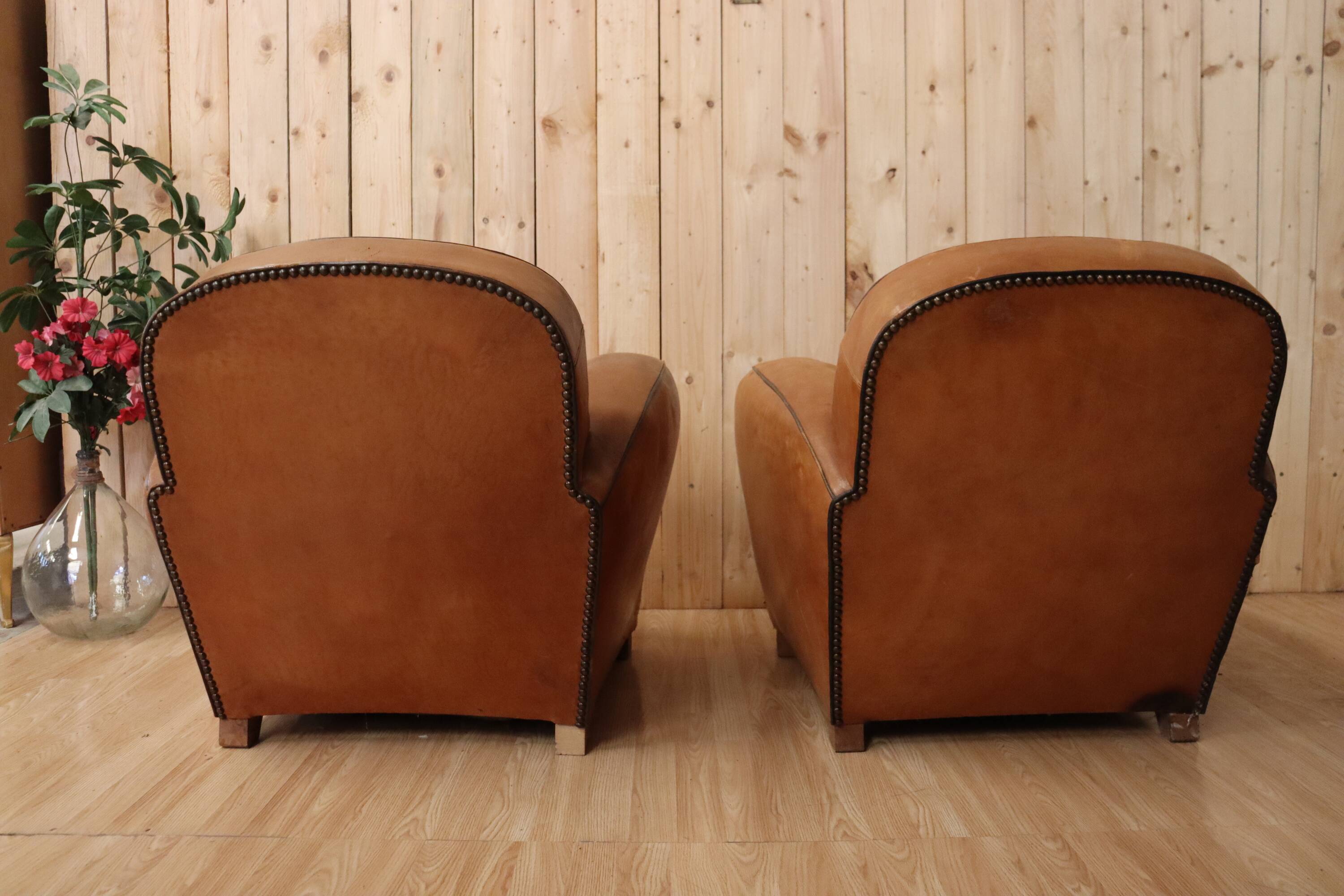Pair of Art Deco leather club armchairs from the 1930s.