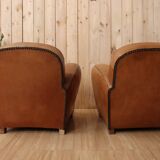 Pair of Art Deco leather club armchairs from the 1930s.