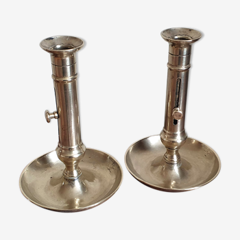 Duo of old brass candle holders