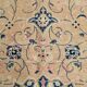 Antique Turkish wool rug in faded floral patterns, 10 x 13 feet.